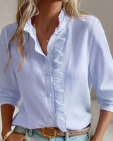 Nikkie - Die rebellische Statement-Bluse in Blau