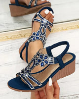 Kirelda - Elegante Keilsandaletten in Marineblau