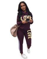 Damen nan sportives Kapuzen-Sweatshirt-Set mit Goldprint und Highwaist-Jogginghose Drune in Violett