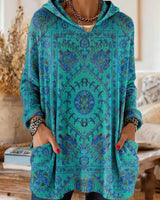 Vintage-inspirierte Kapuzenstrick-Tunika mit Taschen und ethnischem Druck in Blau