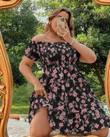Kleid | mit Blumenmuster, Rüschen und Volants in Schwarz