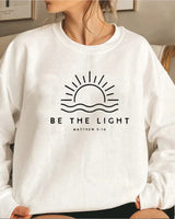 SELENE - "BE THE LIGHT" Sweatshirt in Weiß