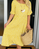 Zora | Figurfreundliches Sommerkleid mit femininer Silhouette in Gelb