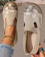 Xara - floraler Slipper in Braun