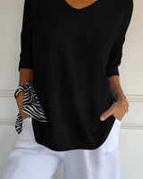 Urina - Soft-Touch-Top mit V-Ausschnitt in Schwarz