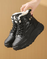 Hohe Damenstiefel mit Thermofutter und erhöhter Sohle - Mirelda in Schwarz
