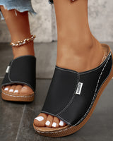 Isabelle | Komfortable Keil-Mule in Schwarz