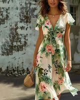Enya | Elegantes Kleid mit Blumenmuster in Mehrfarbig