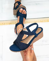 Filya – Bequeme Sandalen Mit Keilabsatz Und Gekreuzten Riemen in Marineblau