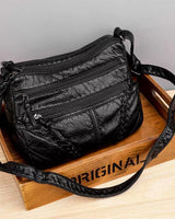 Orisas-Tasche aus Weichem Leder in Schwarz