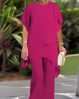 Theresa | Zweiteiliges Set für Damen mit asymmetrischem Oberteil und weiter Hose in Fuchsia