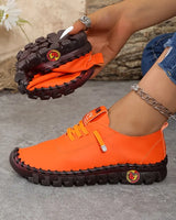 Hilga – Turnschuh Mit Schnürung Und Flexibler Sohle in Orange
