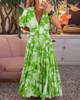 Floriana - Lebhaftes Blumenkleid in Grün (Fast ausverkauft)