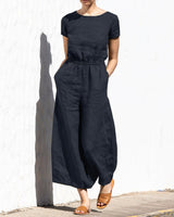 Gerader Jumpsuit mit Falten am Revers ohne Gürtel - Nora in Schwarzes Kurzarm