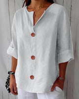 Liore | Minimalistische Bluse mit vertikaler Struktur in Weiß