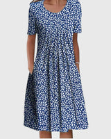 Relina - Figurformendes Rüschenkleid in Blaues Blumenmuster
