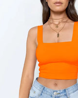 Emma - Glamouröses Glitzer-Rüschen-Crop-Top in Orange