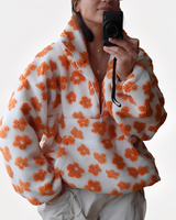 Elizabeth - Stylischer Pullover mit Blumendekoration in Orange