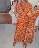 Benara - Printkleid mit V-Ausschnitt in Orange
