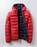 Leichte und thermische Pufferjacke Unisex - Nordika in Orange mit Schwarz
