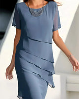 Kendra | Schickes Kleid mit figurschmeichelndem Design in Blau