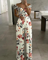 Isla | Damen Overall Off-Shoulder Wickel-Dekolleté Blattdruck in Weiße Blume