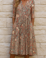 Eliskaa – Elegantes Blumen Kleid Mit V-Ausschnitt in Orange