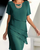 Kendra | Schickes Kleid mit figurschmeichelndem Design in Grün