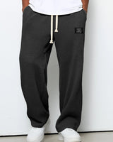 Sem | Weite Hose mit verstellbarem Bund in Schwarz