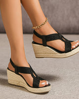 Niyar – Espadrilles Sandalen mit Keilabsatz und gewebtem Fersenriemen in Schwarz
