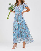 Lea - Ein vielseitiges Blumen-Midikleid für jede Gelegenheit in Hellblau