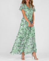 Lea - Ein vielseitiges Blumen-Midikleid für jede Gelegenheit in Grün
