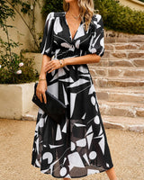 Doherty - Lockere Blumige Midikleid in Schwarz