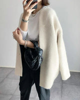 Miline - Lässige Strickjacke mit langen Ärmeln in Cremeweiß