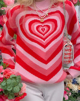 Damen nan oversized Strickpullover mit Herz-Intarsie und Chevron-Muster Drune in Rot