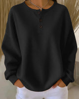Damen nan Oversized Waffelstrick Henley-Pullover mit Knopfleiste und abgerundetem Saum Drune in Schwarz