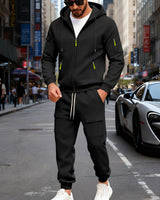 Herren nan sportliches Cargo-Jogging-Set mit Kapuzenjacke, durchgehendem Reißverschluss und funktionalen Mehrzwecktaschen Drune in Schwarz