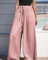Damen nan weite Palazzo-Hose mit hohem Paperbag-Bund, elastischem Tunnelzug und vorderer Beinschlitz Drune in Rosa