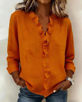 Brinae - Bluse mit weicher Haptik und langen Rüschenbesätzen am V-Ausschnitt in Orange