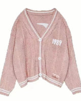 Damen nan kurz geschnittene Strickjacke mit V-Ausschnitt, Kontrastpaspel und oversized Ärmeln Drune in Rosa