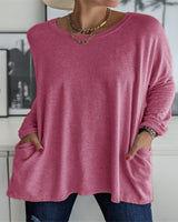 Damen nan oversized Longsleeve-Tunika mit Rundhalsausschnitt, überschnittener Schulter und aufgesetzten Taschen Drune in Lederrot