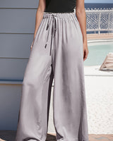 Damen nan weite Palazzo-Hose mit hohem Paperbag-Bund, elastischem Tunnelzug und vorderer Beinschlitz Drune in Grau