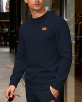 Herren nan strukturierter Baumwollstrickpullover mit Rautenstruktur, Rundhalsausschnitt und elastischen Bündchen Drune in Navyblau