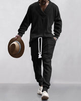 Herren nan gestricktes Lounge-Set mit V-Ausschnitt, Kabelstruktur und Kordelzug-Jogginghose Drune in Schwarz