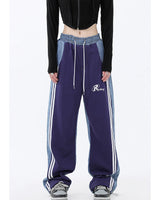 Damen nan weite Jogginghose mit Denim-Einsätzen, elastischem Bund und seitlichen Kontraststreifen Drune in Violett 21113
