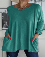 Damen nan oversized Longsleeve-Tunika mit Rundhalsausschnitt, überschnittener Schulter und aufgesetzten Taschen Drune in Pfauenblau
