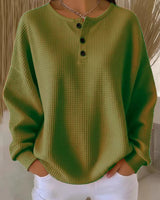 Damen nan Oversized Waffelstrick Henley-Pullover mit Knopfleiste und abgerundetem Saum Drune in Olivgrün