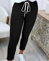 Damen nan taillierte Freizeithose mit Kordelzug und Umschlagbündchen Drune in Schwarz