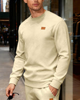 Herren nan strukturierter Baumwollstrickpullover mit Rautenstruktur, Rundhalsausschnitt und elastischen Bündchen Drune in Khaki