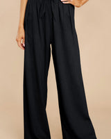 Damen nan Leinenhose mit Paperbag-Bund und weitem Bein Drune in Schwarz